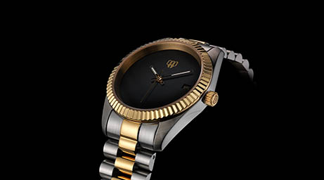 Black background Explorer of Men's watch with silver and gold bracelet