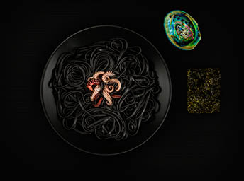 Black background Explorer of Barilla black squid ink pasta