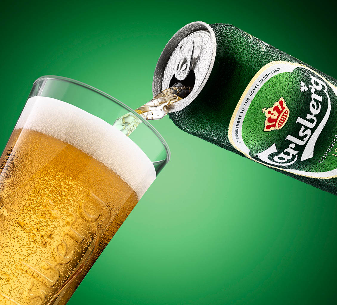 Packshot Factory - Coloured background - Carlsberg beer pour from the can