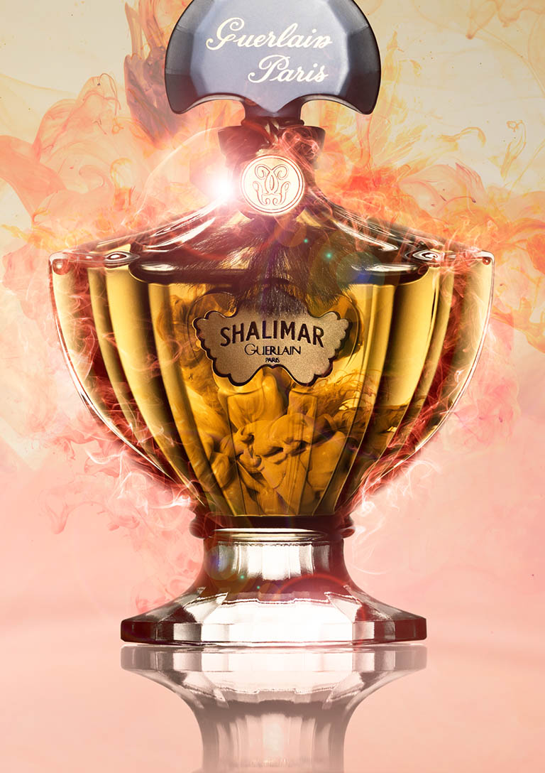 Packshot Factory - Coloured background - Guerlain Shalimar perfume bottle and smoke