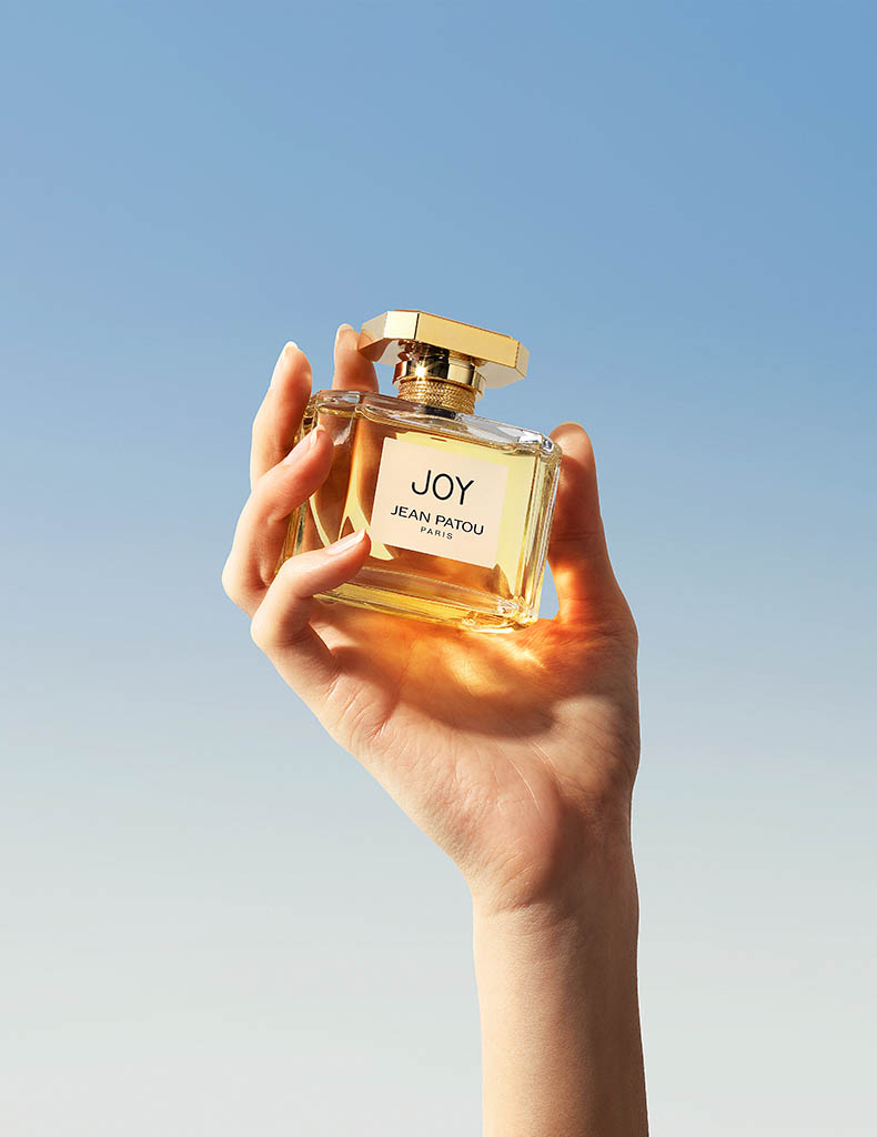 Cosmetics Photography of Joy fragrance bottle by Packshot Factory