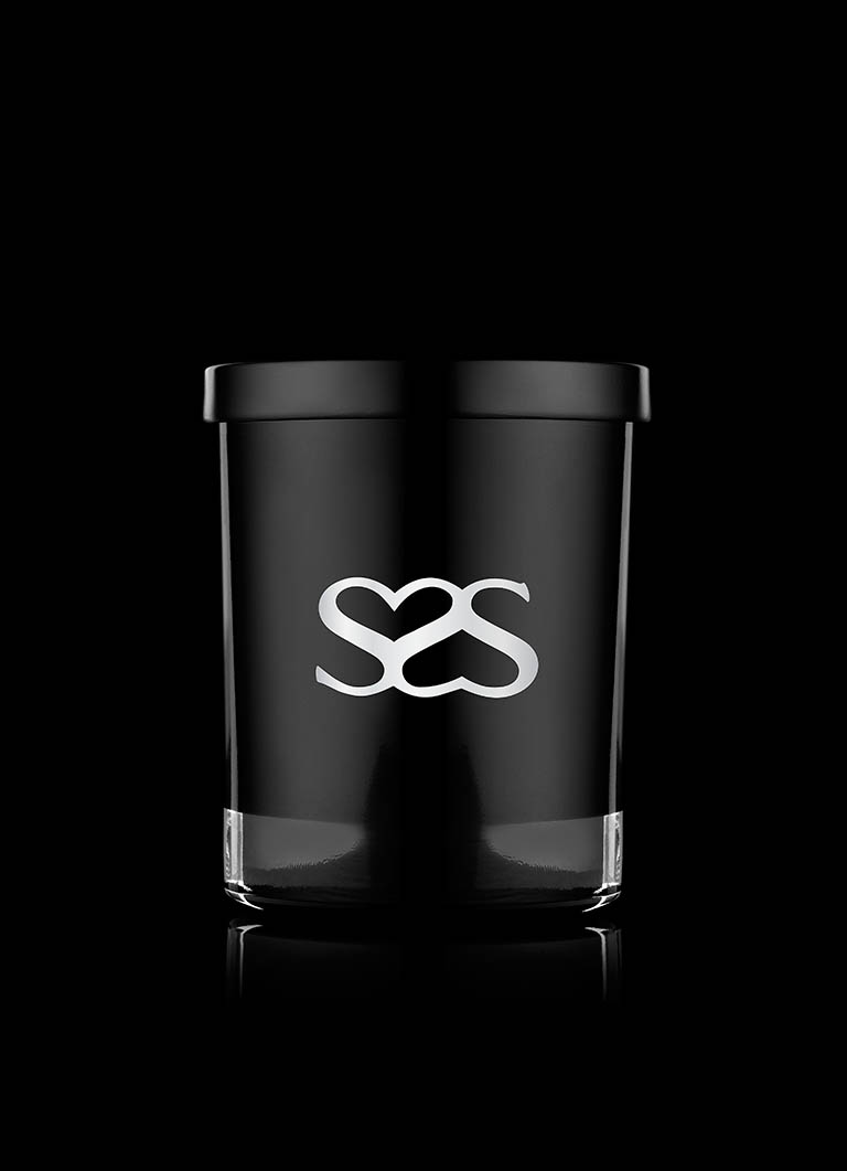 Cosmetics Photography of Secret Seduction candle by Packshot Factory