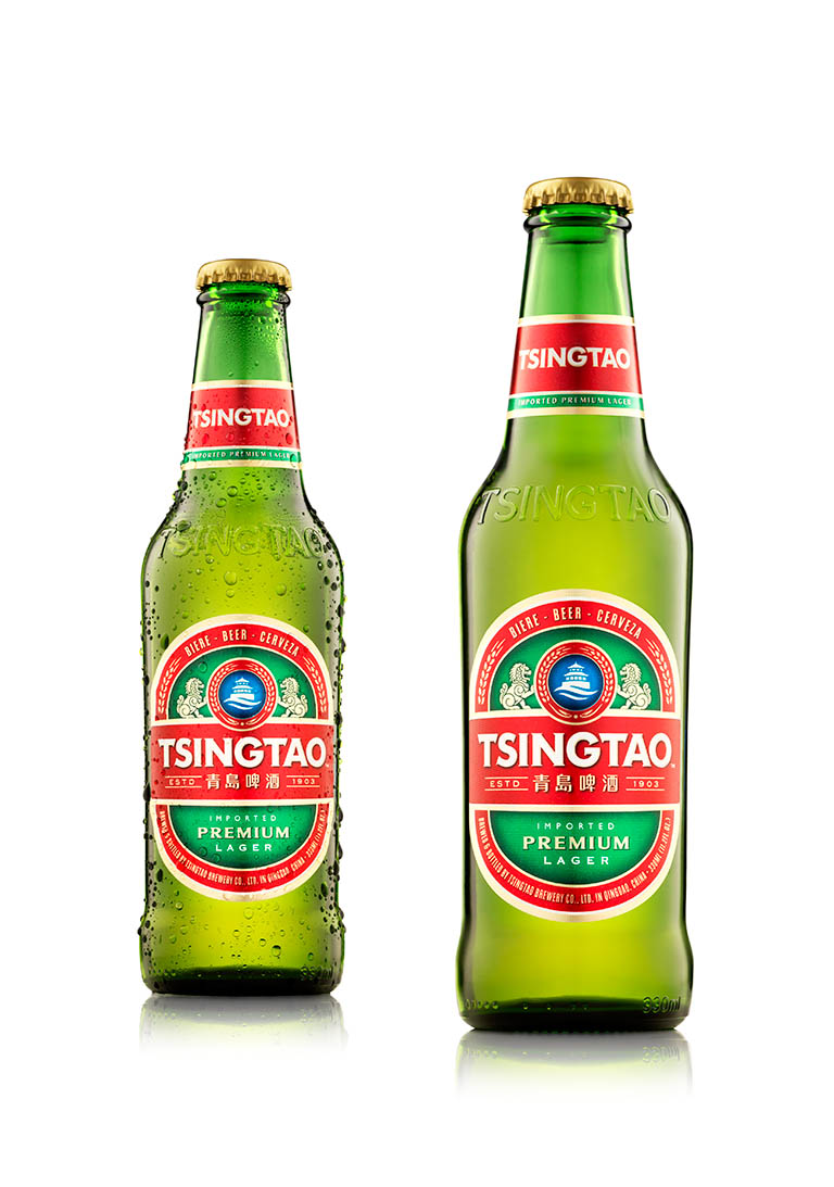Drinks Photography of Tsingtao lager bottles by Packshot Factory