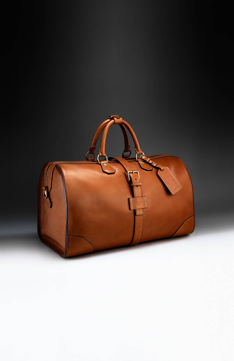 Fashion Photography of Alfred Dunhill leather travel bag by Packshot Factory