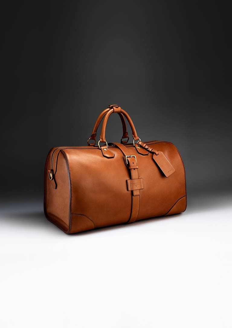 Fashion Photography of Alfred Dunhill leather travel bag by Packshot Factory