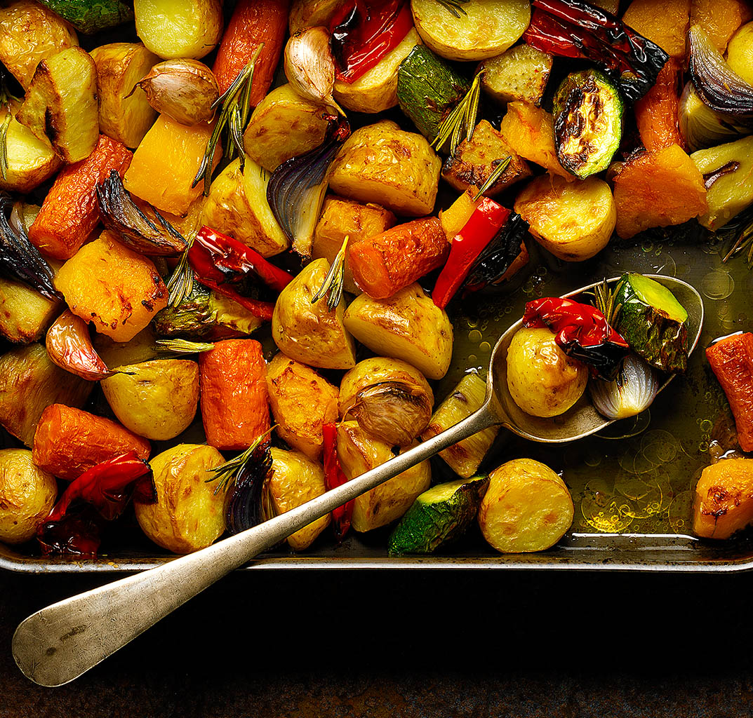 Food Photography of Roasted potatoes and carrots by Packshot Factory