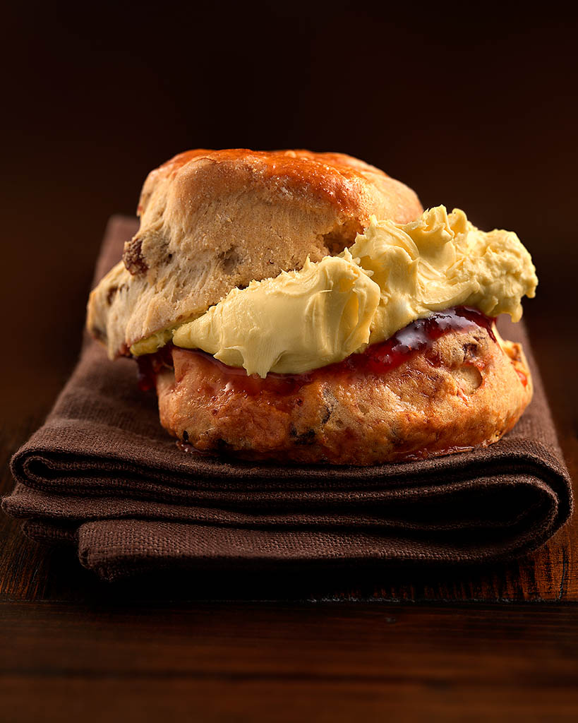 Food Photography of Scone with jam and cream by Packshot Factory