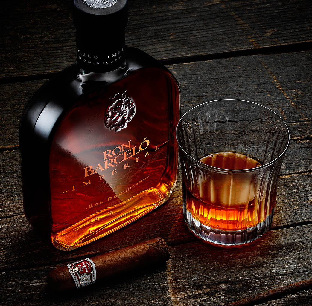 Packshot Factory - Glass - Ron Barcelo rum bottle and serve