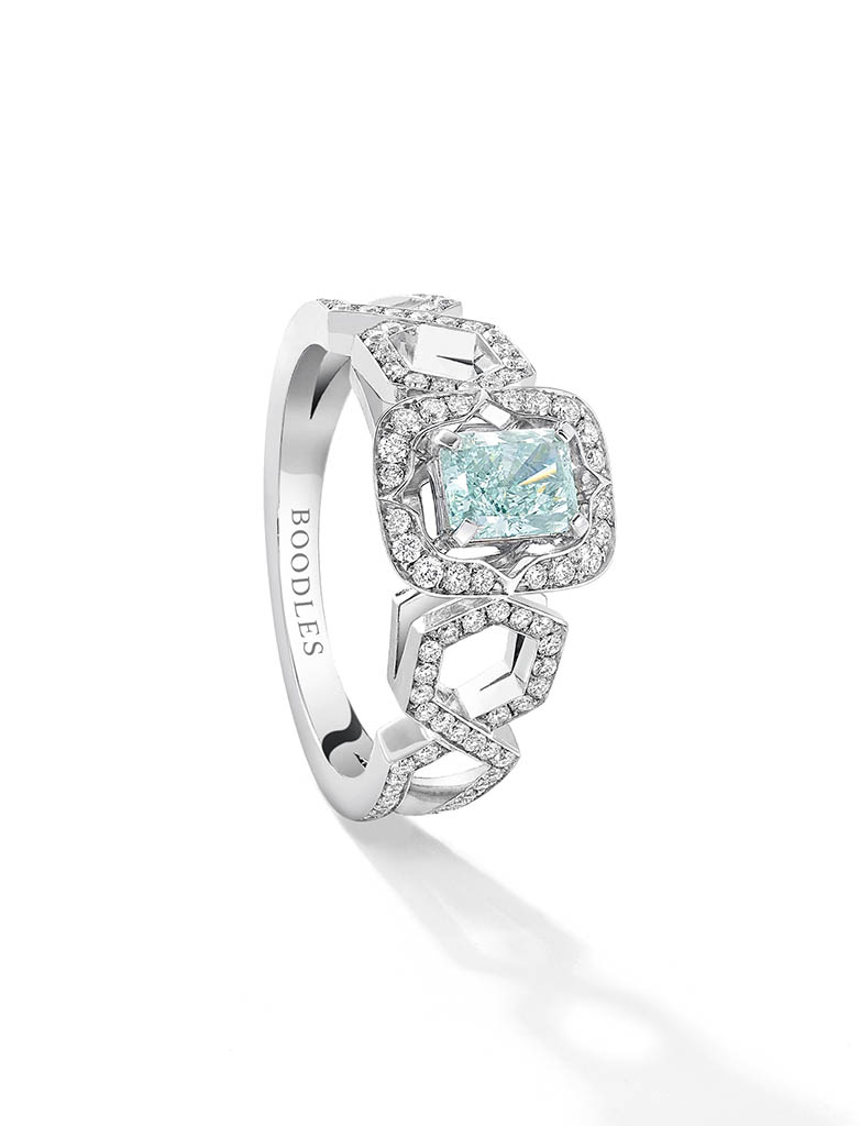 Jewellery Photography of Boodles platinum ring with white and aquamarine diamonds by Packshot Factory