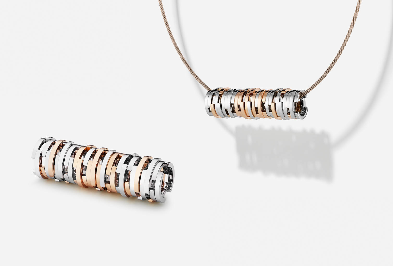 Jewellery Photography of Maison Dauphin white gold and gold pendants by Packshot Factory