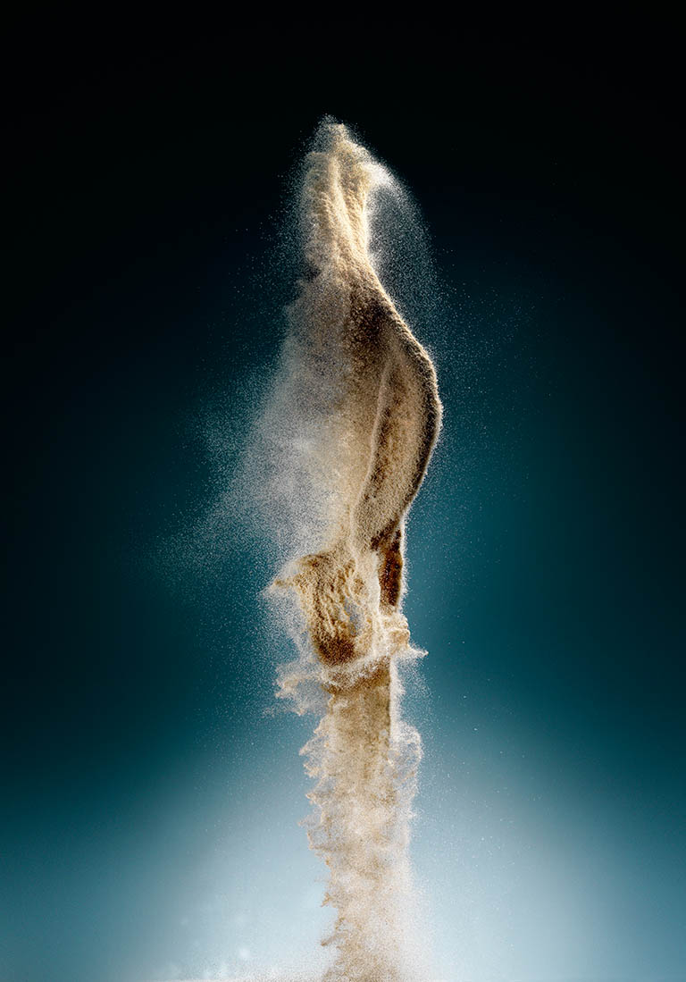 Liquid / Smoke Photography of Sand explosion by Packshot Factory