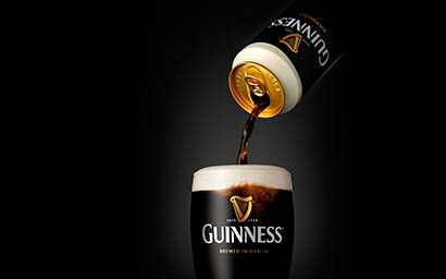 Black background Explorer of Guinnes beer pour