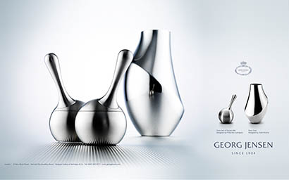 Coloured background Explorer of Georg Jensen flower vase and salt and pepper set