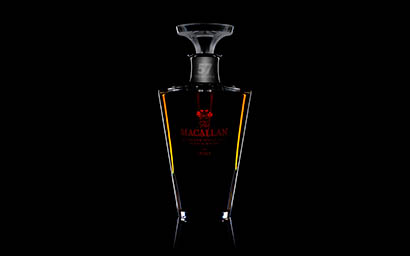 Black background Explorer of Macallan whisky bottle