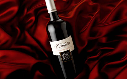 Coloured background Explorer of Colletta red wine bottle