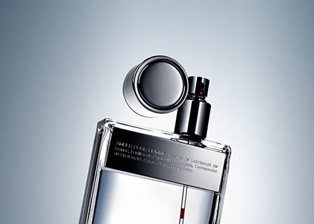 Cosmetics Photography of Prada Amber perfume bottle