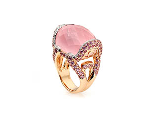 White background Explorer of Gold ring with pink opal