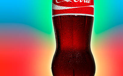 Coloured background Explorer of Coca Cola bottle