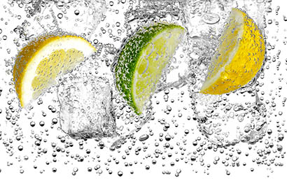 Liquid Explorer of Lemons and lime in water with ice and bubbles