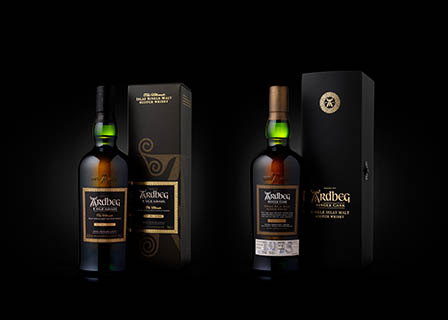 Black background Explorer of Ardbeg whisky bottle box set