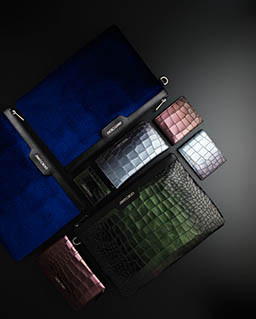 Black background Explorer of Jimmy Choo wallet and purse
