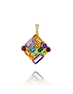 White background Explorer of Gold pendant with gemstones