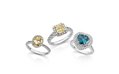 White background Explorer of Tiffany platinum rings with yellow diamond and sapphire