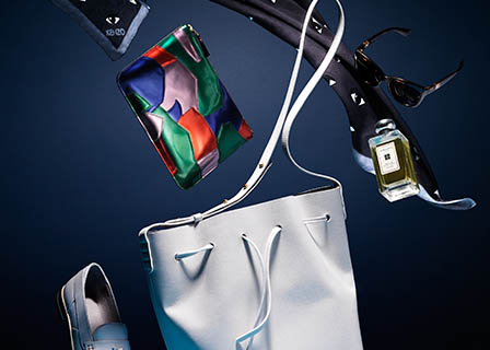 Womens fashion Explorer of Handbag, Prada purse, LK Bennett loafers, Kenzo scarf, Jo Malone fragrance bottle, DG sunglasses.