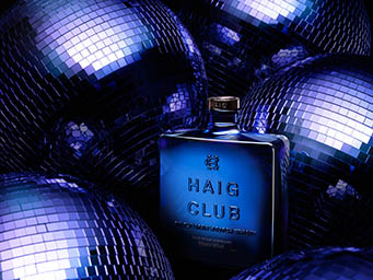 Coloured background Explorer of Haig Club whisky bottle