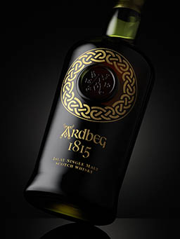 Black background Explorer of Ardbeg whisky bottle