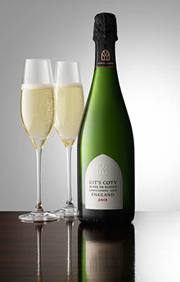 Glass Explorer of Kit's Coty champagne bottle and serve