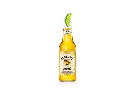 White background Explorer of Malibu beer bottle with lime wedge