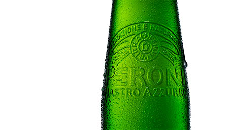 Lager Explorer of Peroni bottle with spritz close up