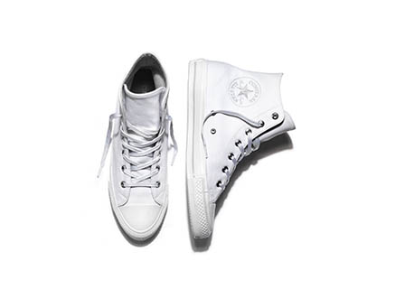 Fashion Photography of Converse white trainers