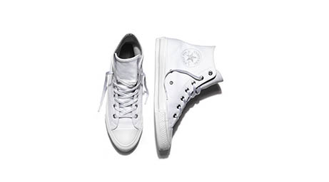 White background Explorer of Converse white trainers