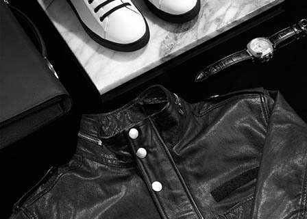 Accessories Explorer of Armani men's trainers and leather jacket