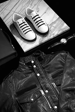 Footwear Explorer of Armani men's trainers and leather jacket