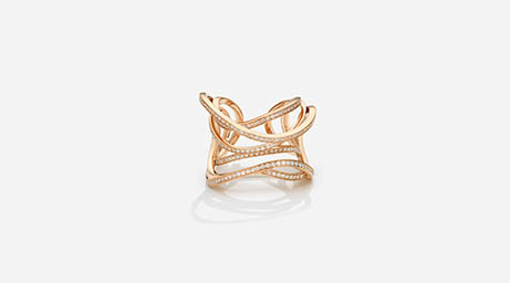 White background Explorer of Maison Dauphin gold ring with diamonds