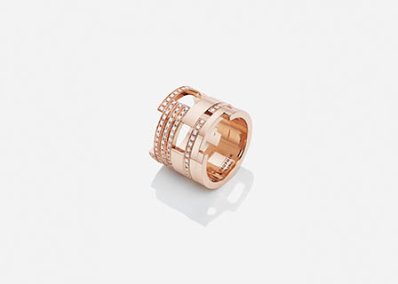 White background Explorer of Maison Dauphin gold ring with diamonds