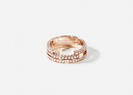 White background Explorer of Maison Dauphin gold band with diamonds