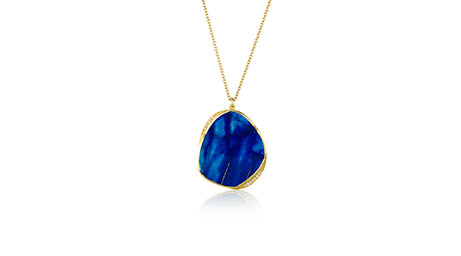 White background Explorer of Yello gold chain and pendant with lapis lazuli gemstone