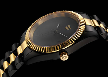 Black background Explorer of Men's watch with black and gold bracelet