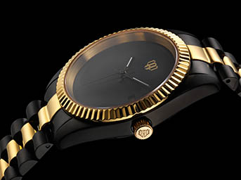 Black background Explorer of Men's watch with black and gold bracelet