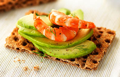 Fruits and vegetables Explorer of Ryvita witha vocado and prawn