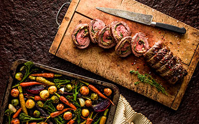 Hot food Explorer of Pork roulade and roasted vegetables