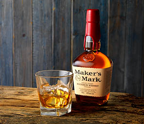 Glass Explorer of Maker's Mark bourbon whisky bottle and serve