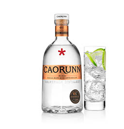 White background Explorer of Caorunn gin bottle and serve