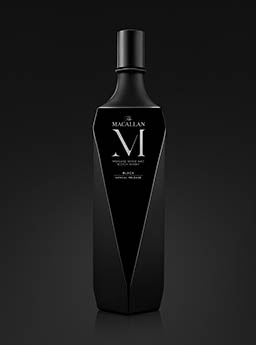 Black background Explorer of Macallan whisky bottle black annual release