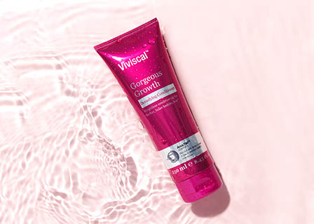 Haircare Explorer of Viviscal conditioner tube in water