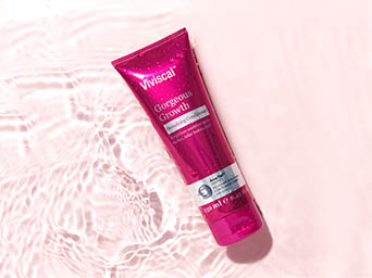 Cosmetics Photography of Viviscal conditioner tube in water
